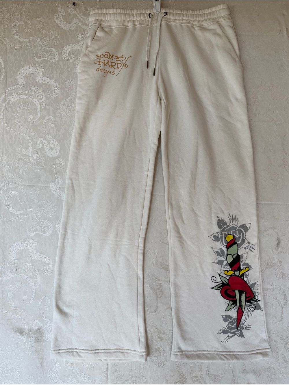 Ed Hardy Cream Wide-Leg Sweatpants with Red & Yellow Dagger Graphic